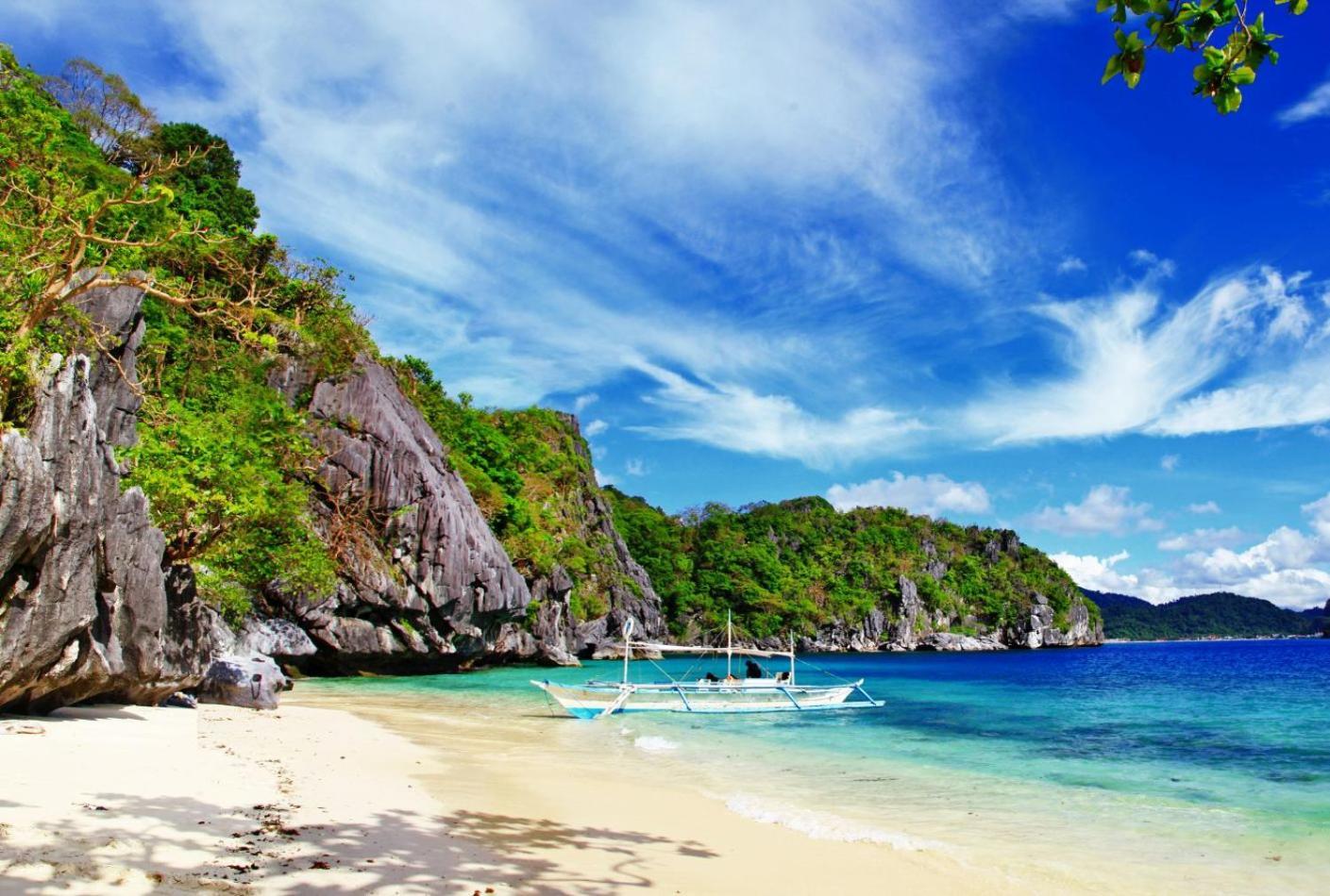 Mbg Travellers Inn Powered By Cocotel Puerto Princesa Dış mekan fotoğraf