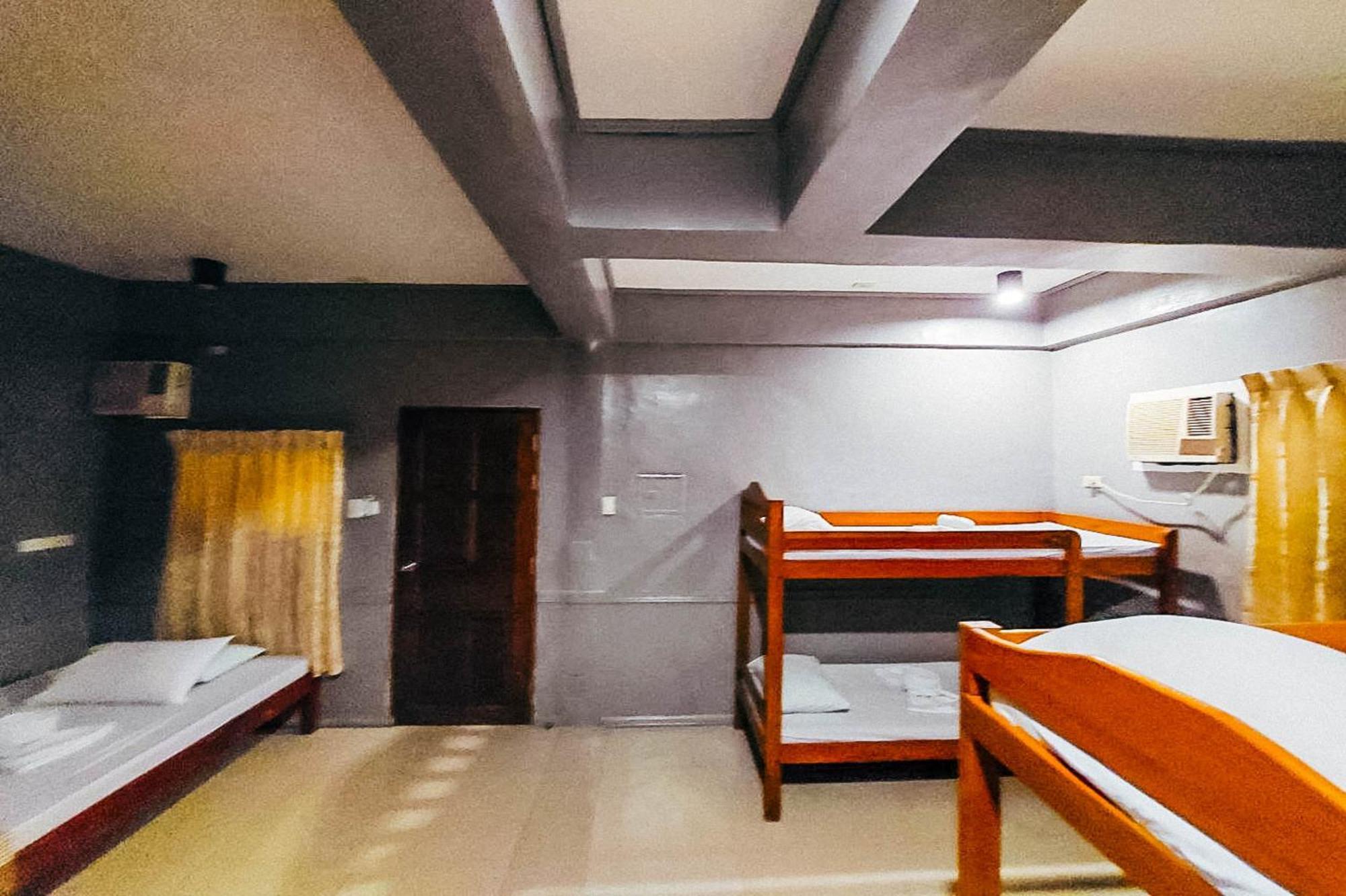 Mbg Travellers Inn Powered By Cocotel Puerto Princesa Oda fotoğraf