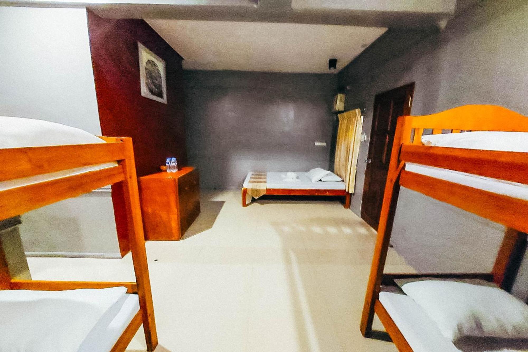 Mbg Travellers Inn Powered By Cocotel Puerto Princesa Oda fotoğraf