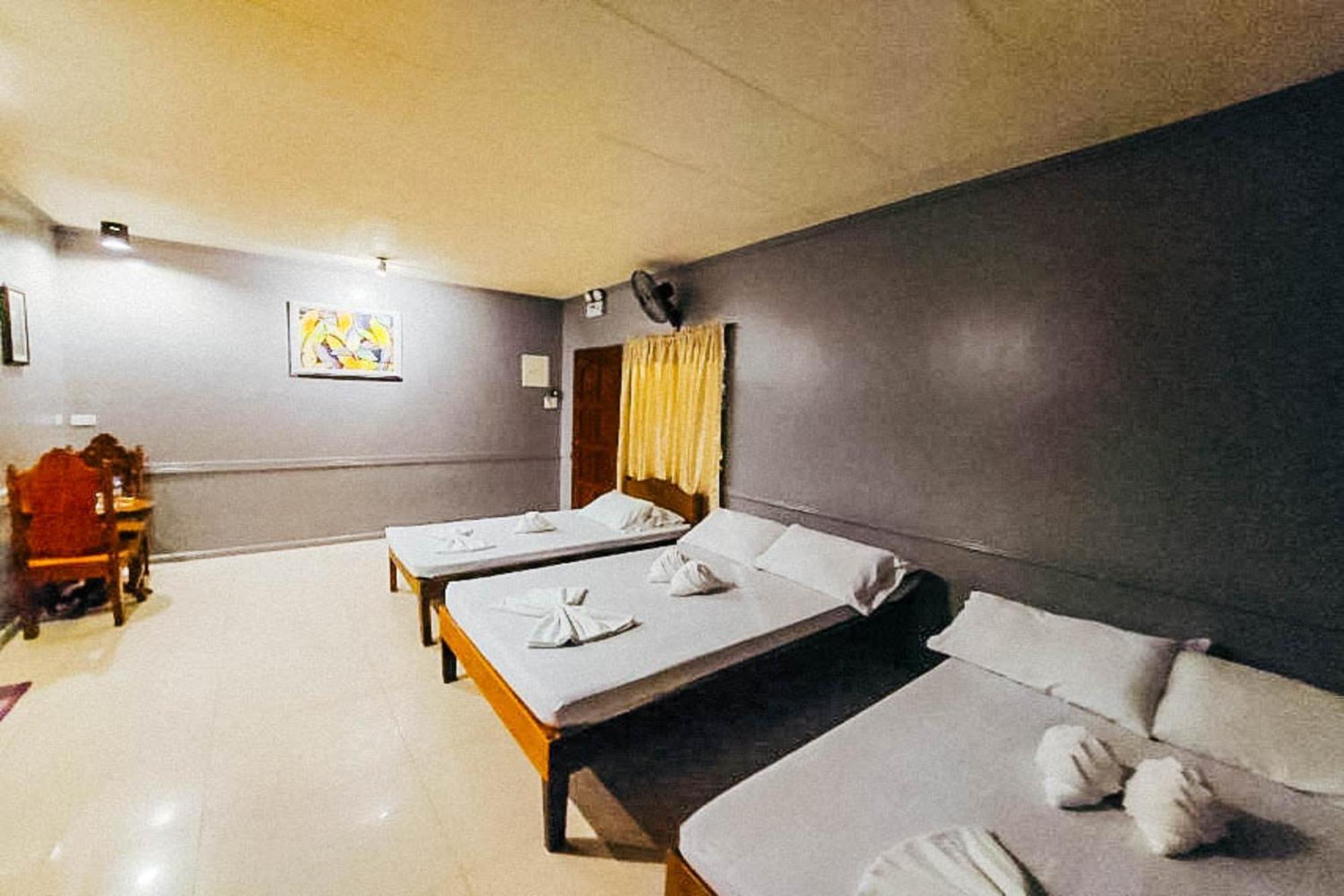 Mbg Travellers Inn Powered By Cocotel Puerto Princesa Oda fotoğraf
