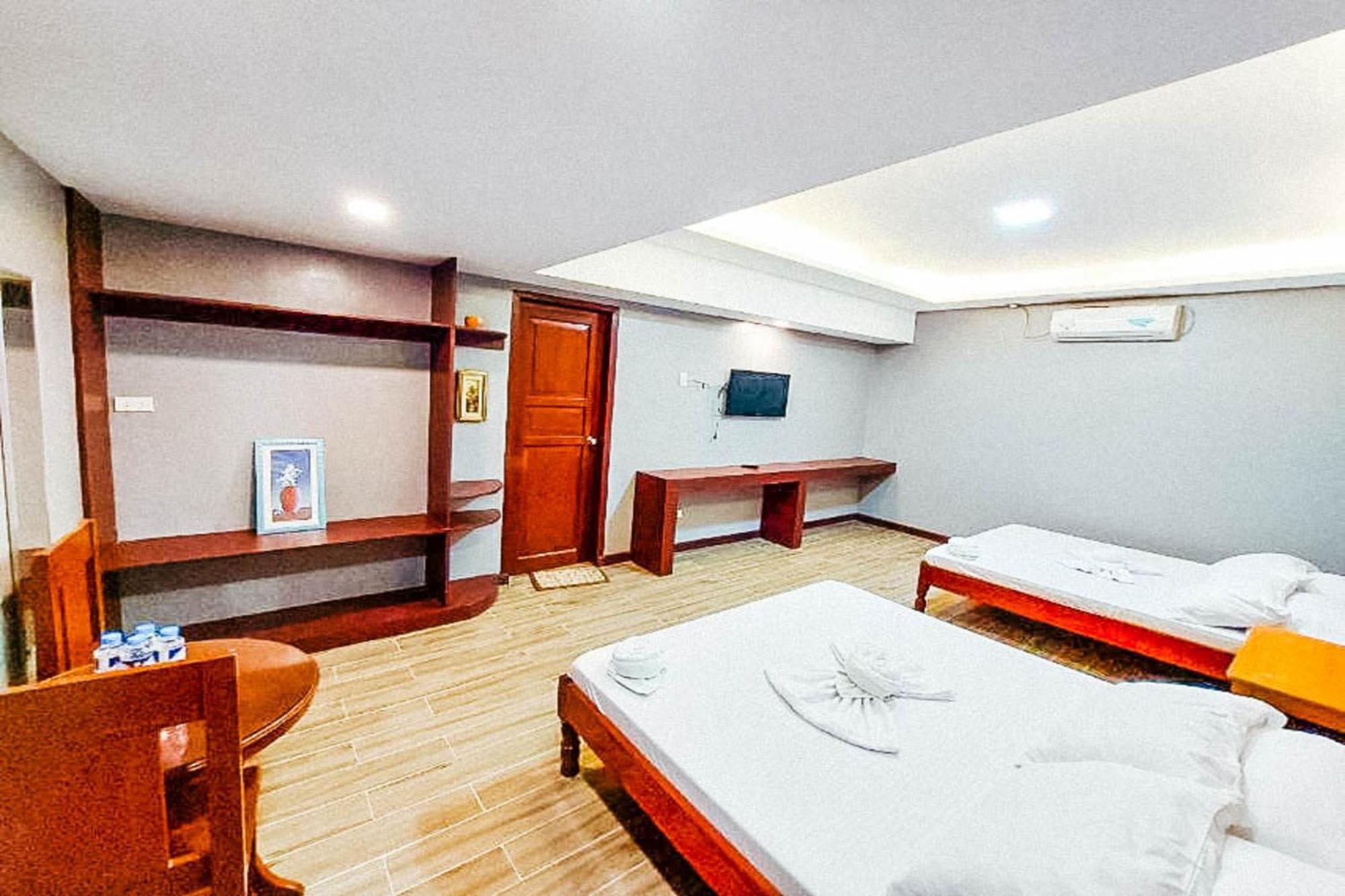 Mbg Travellers Inn Powered By Cocotel Puerto Princesa Oda fotoğraf