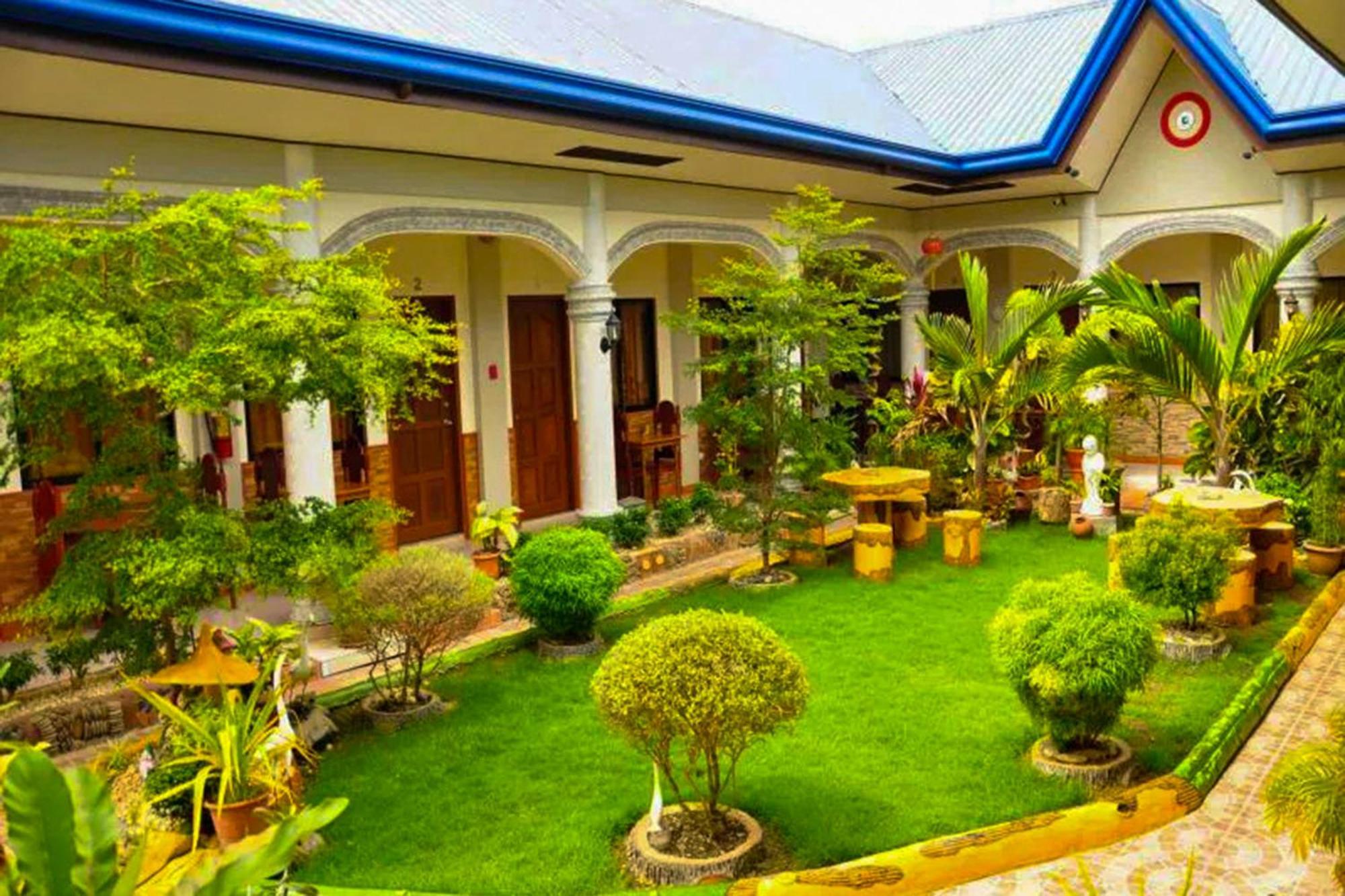 Mbg Travellers Inn Powered By Cocotel Puerto Princesa Dış mekan fotoğraf