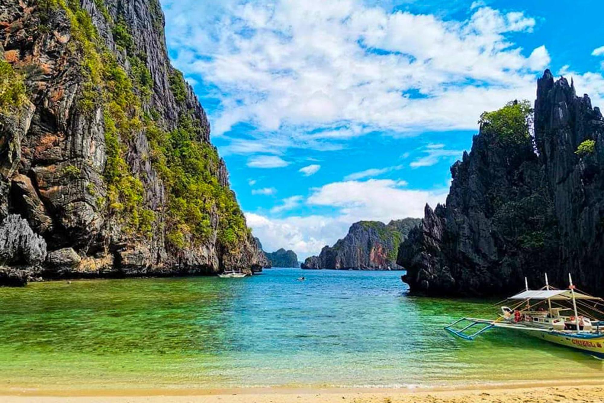 Mbg Travellers Inn Powered By Cocotel Puerto Princesa Dış mekan fotoğraf