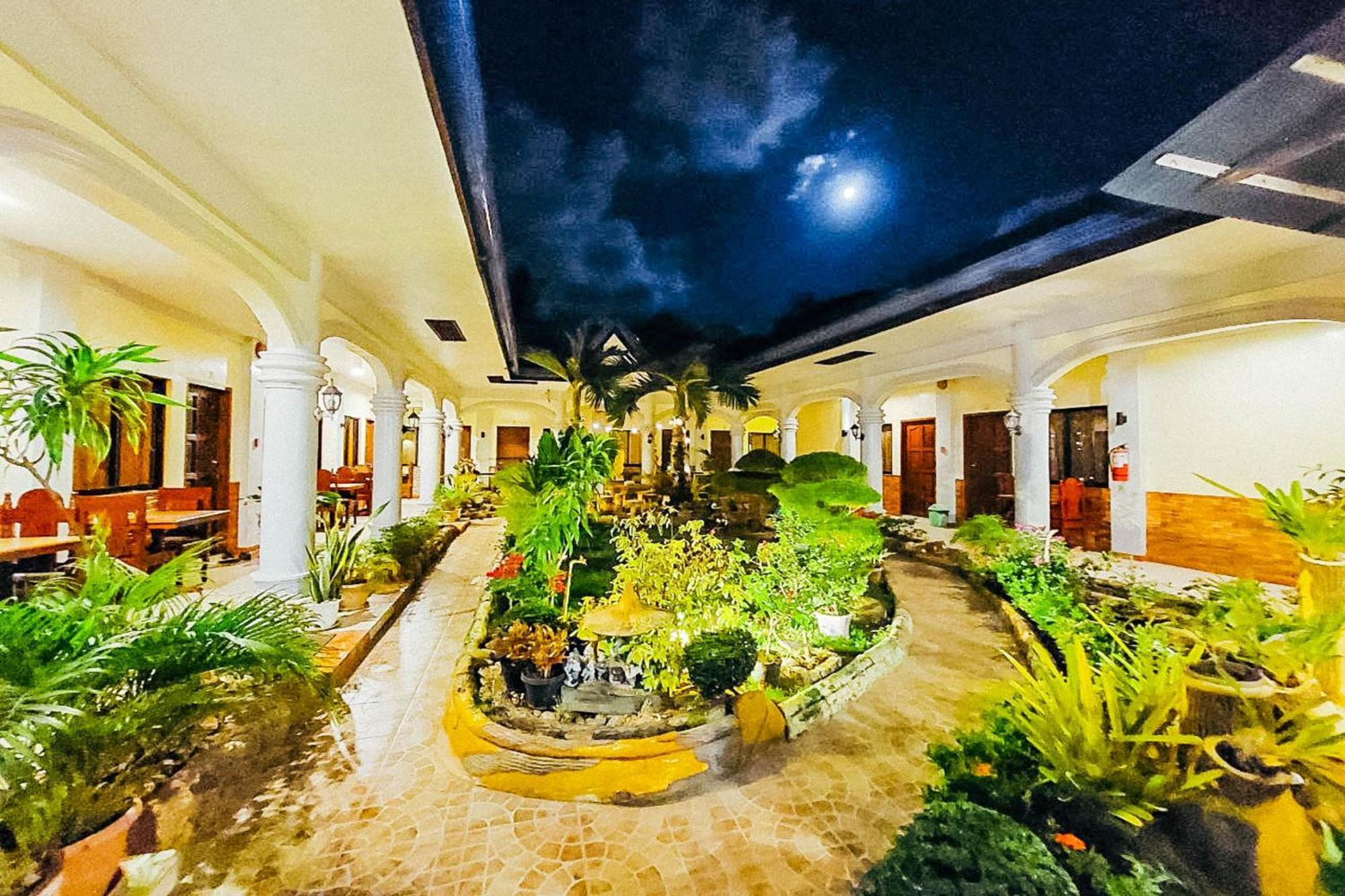 Mbg Travellers Inn Powered By Cocotel Puerto Princesa Dış mekan fotoğraf